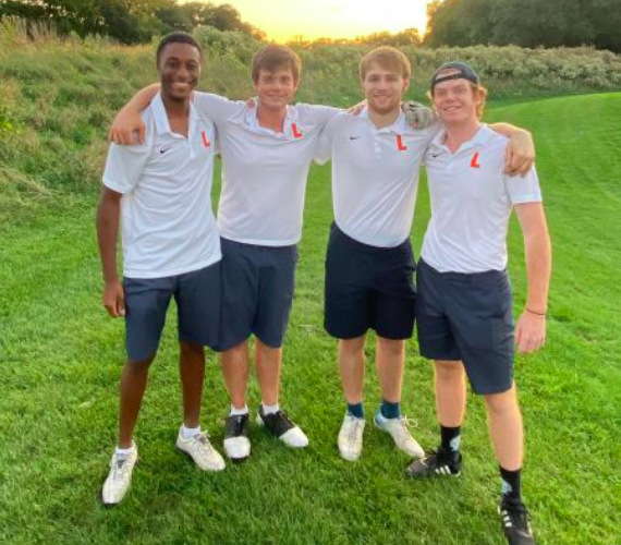 Last year’s golf seniors, George, Rob, Mac, and Kendal, pose for a photo