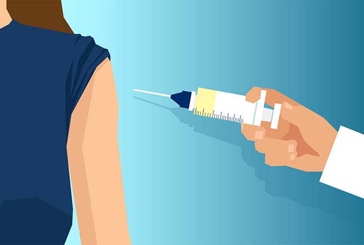 Vector of a doctor with syringe injecting vaccine to a patient shoulder.