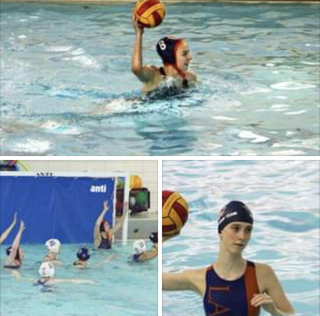 Girls water polo team battling hard during a grueling game