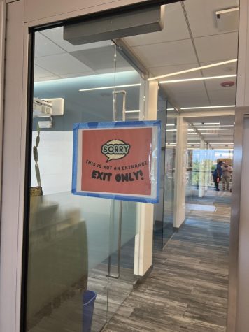 The sign indicates the locked fourth-floor door, preventing students from entering the quiet study space.