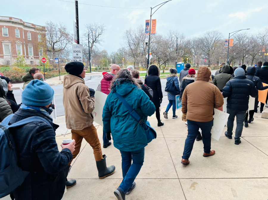 Members of the Latin School Union walking around Latin's campus on Wednesday, November 16, signs and flyers in hand.