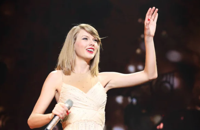 Taylor+Swift+waving+goodbye%2C+as+many+fans+sadly+did+to+their+dreams+of+seeing+her+live+in+her+upcoming+tour.