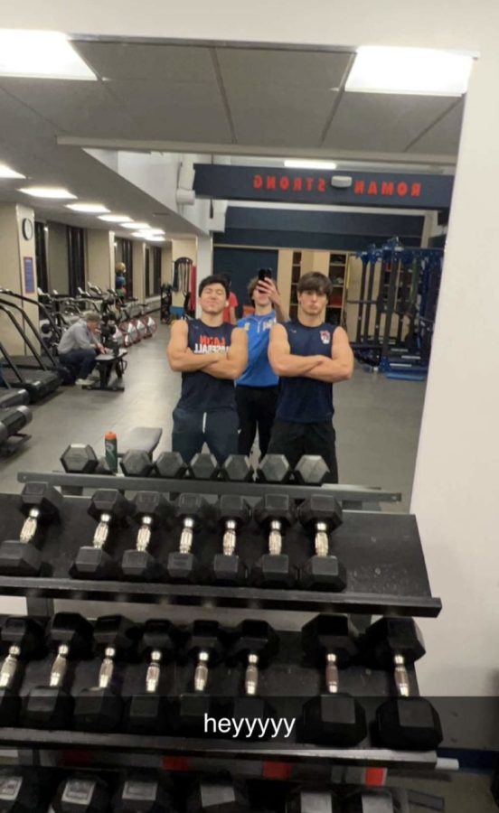 Senior Patrick Shrake, junior Mitch Romano, and senior Ben Flerlage flexing that they followed through with their 2022 New Years resolution of working out more.