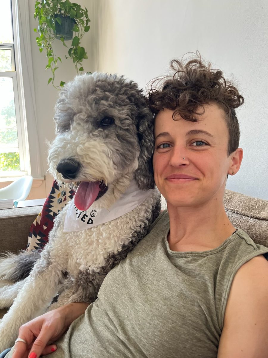 Ms. Wilde, Latins newest Upper School physics teacher, poses with her dog Arlo.