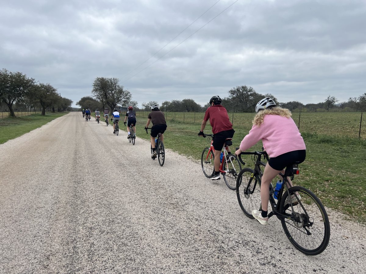 Latin students bike along the beautiful roads of Texas.