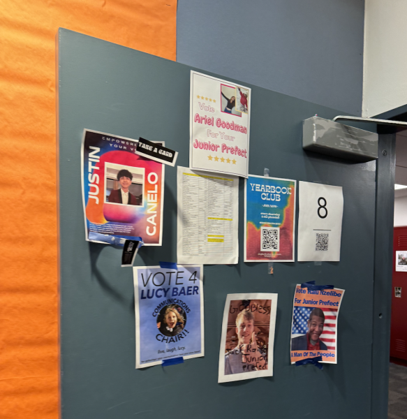Latin Student Government campaign posters on the door to the 3rd floor.