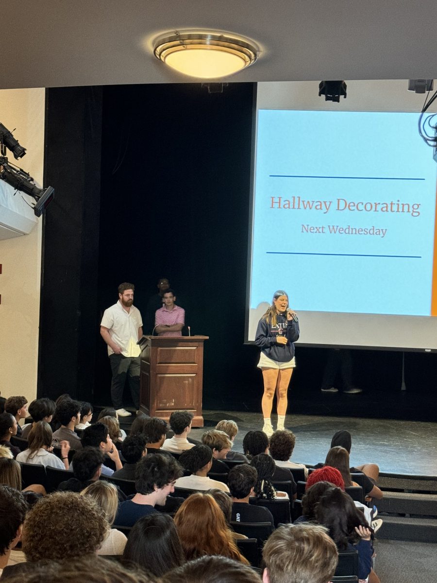 Senior Juliette Katz presents for student government during gathering.