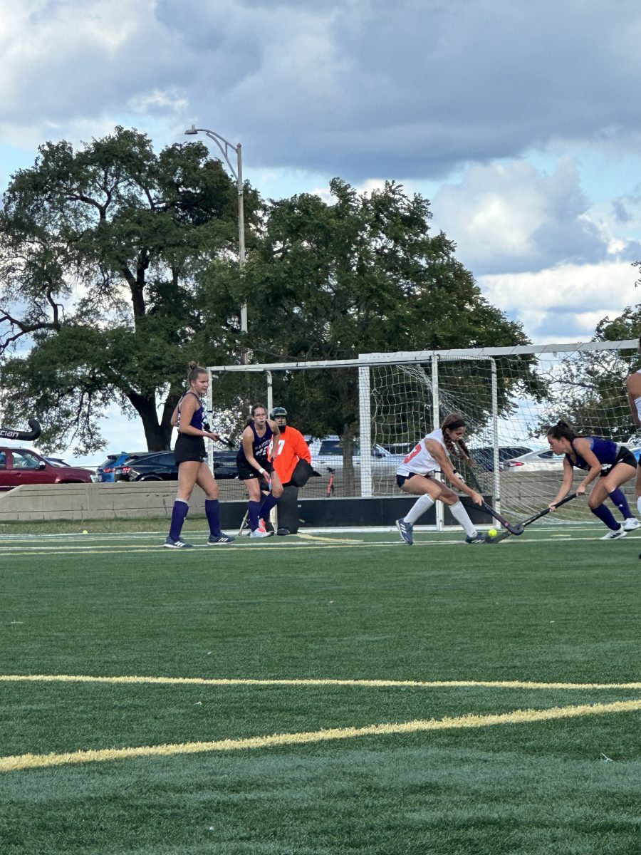 Fini Mendoza Pena defends the ball, moments before scoring the first of her three goals during the NSCD Game. 