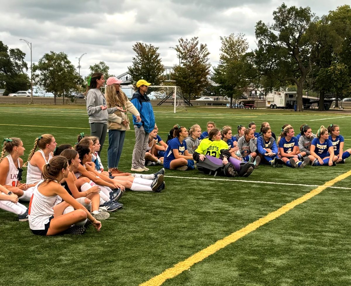 Latin and Lake Forest High School field hockey players and coaches come together for their annual Play Without Limits game.