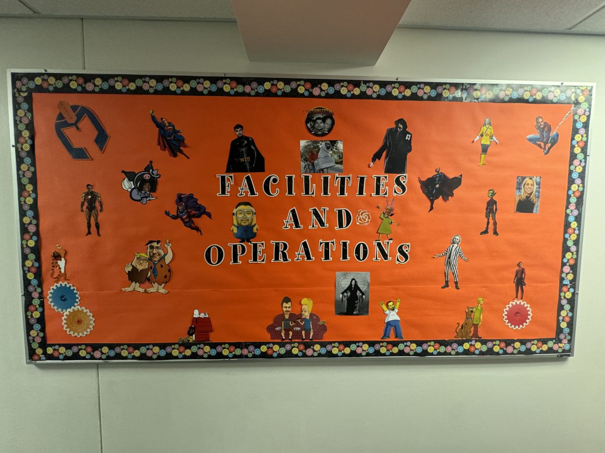 The Facilities and Operations bulletin board decorated for Halloween. 