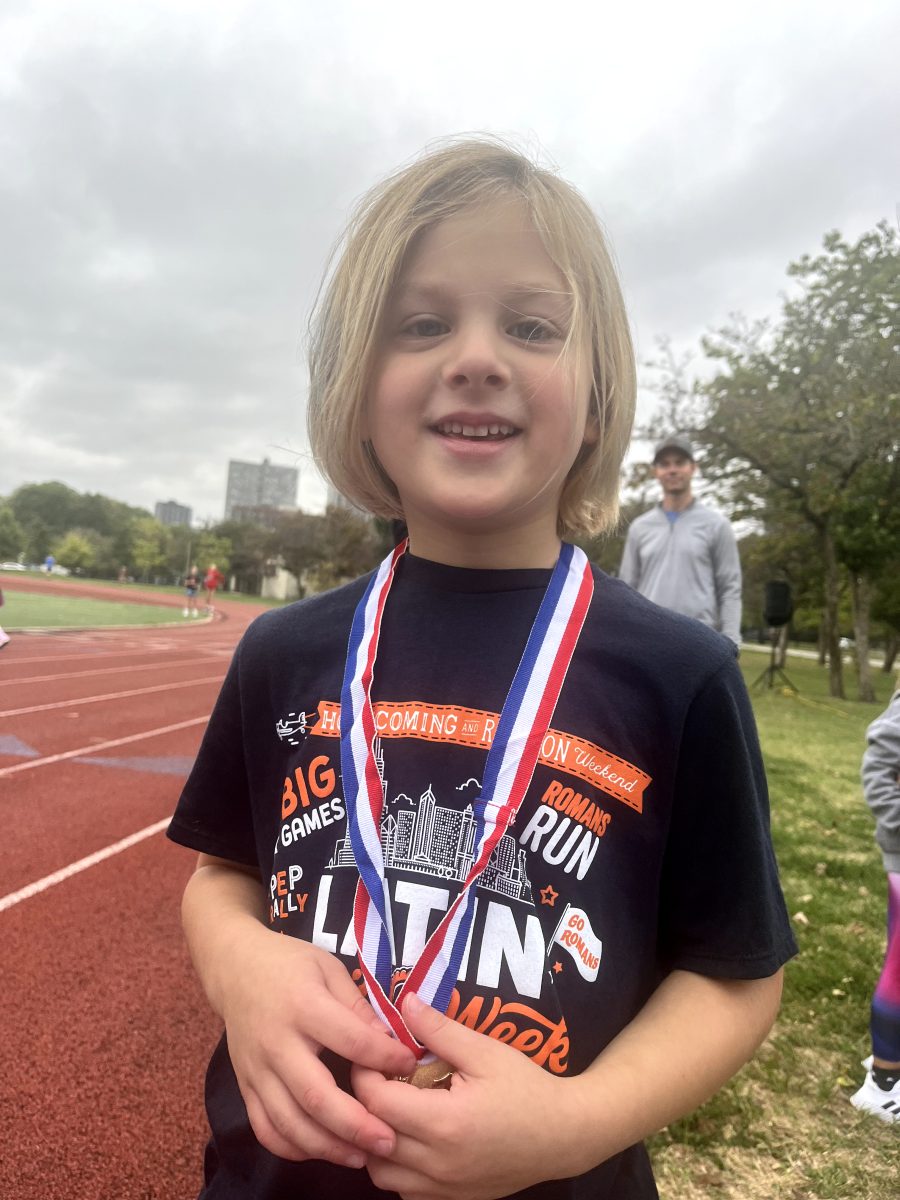 First grader Lev Liss after receiving his medal.