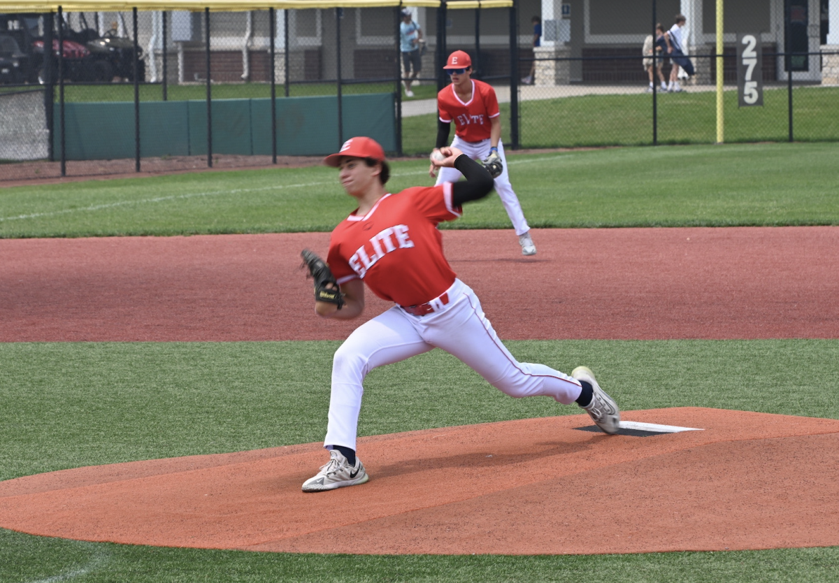 Noah Katz pitching for his travel baseball team