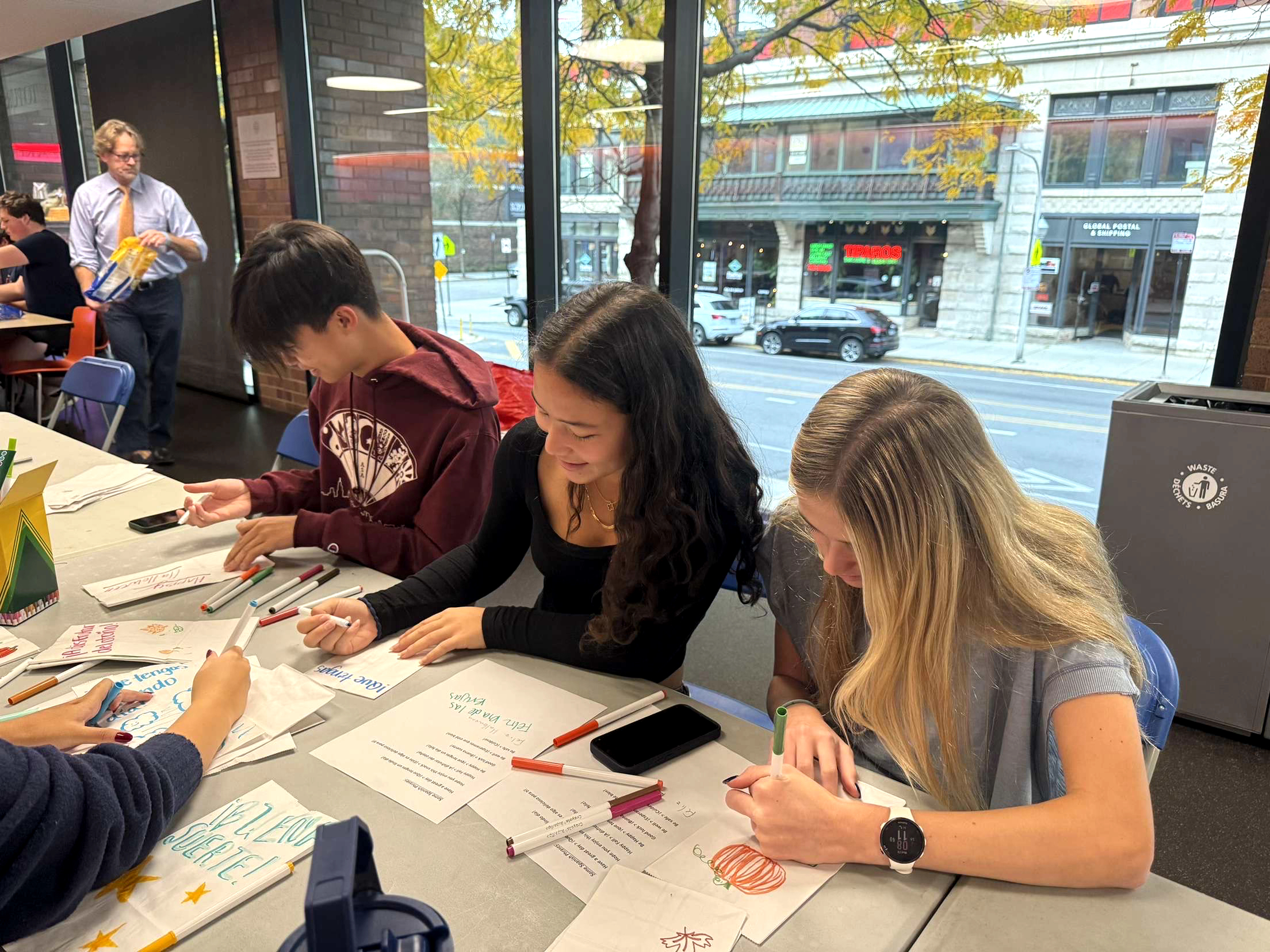 Juniors work on cards for a service project.