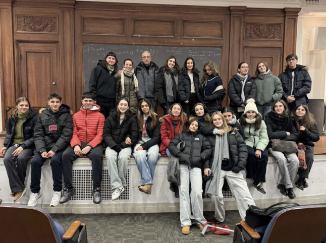 Exchange students from Spain take a break from exploring Chicago to pose for a group photo.