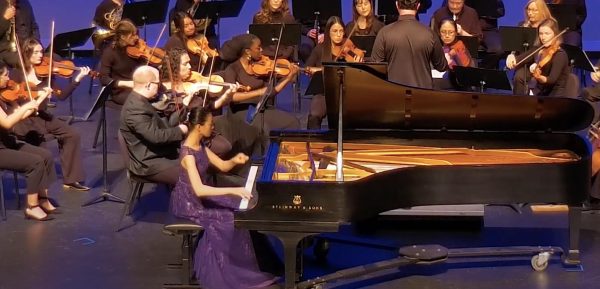 Edie Park playing with the NEIU orchestra 