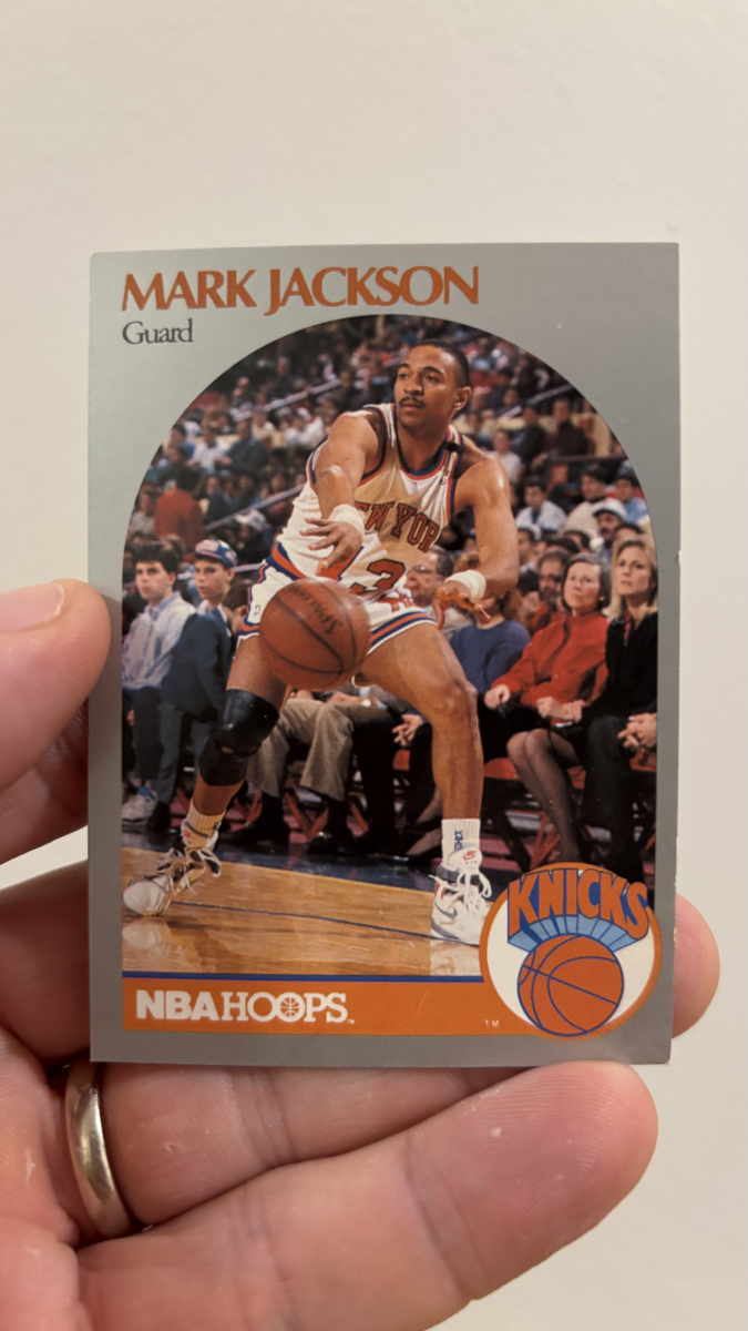 This 1990 Mark Jackson basketball card featured the Menendez brothers sitting courtside while on their post-murder spending spree using their parents' money.