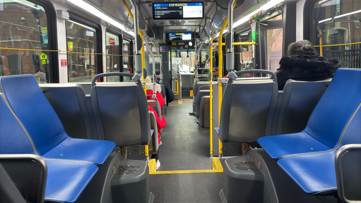 Inside a 74 Fullerton bus during morning rush.