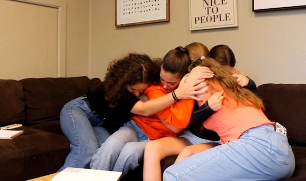 Actors Mia Wetzler, Noa Stern Frede, Lindsay Chyna, and Simone Arvetis pose for a scene in "Untamed." This is Izzy Schafer's favorite shot of the film. 