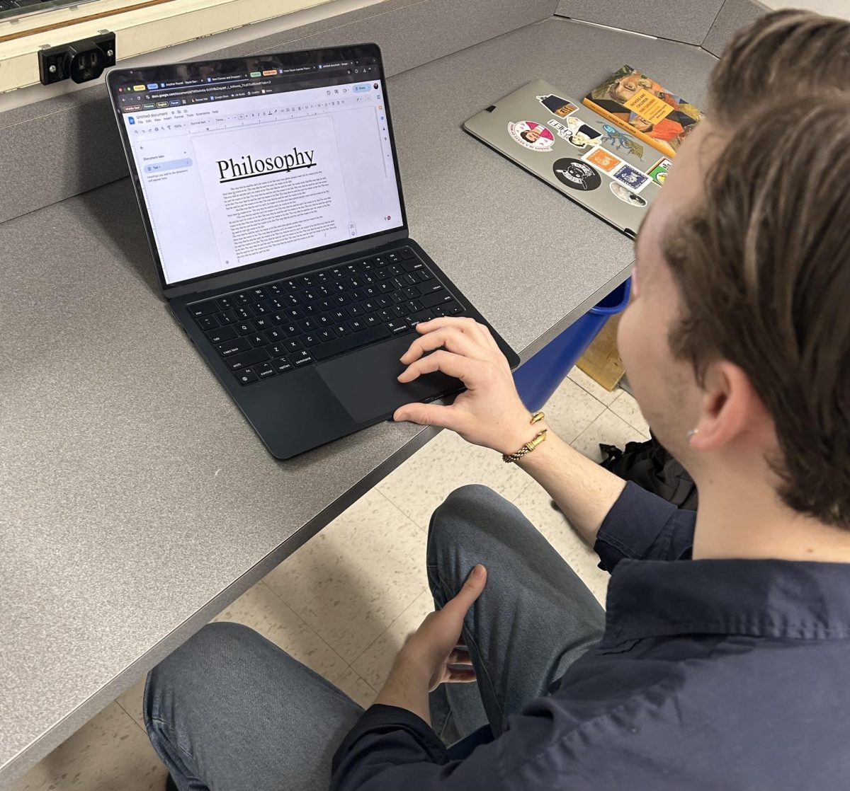 Senior Will Wichman reviews work from his philosophy class. 
