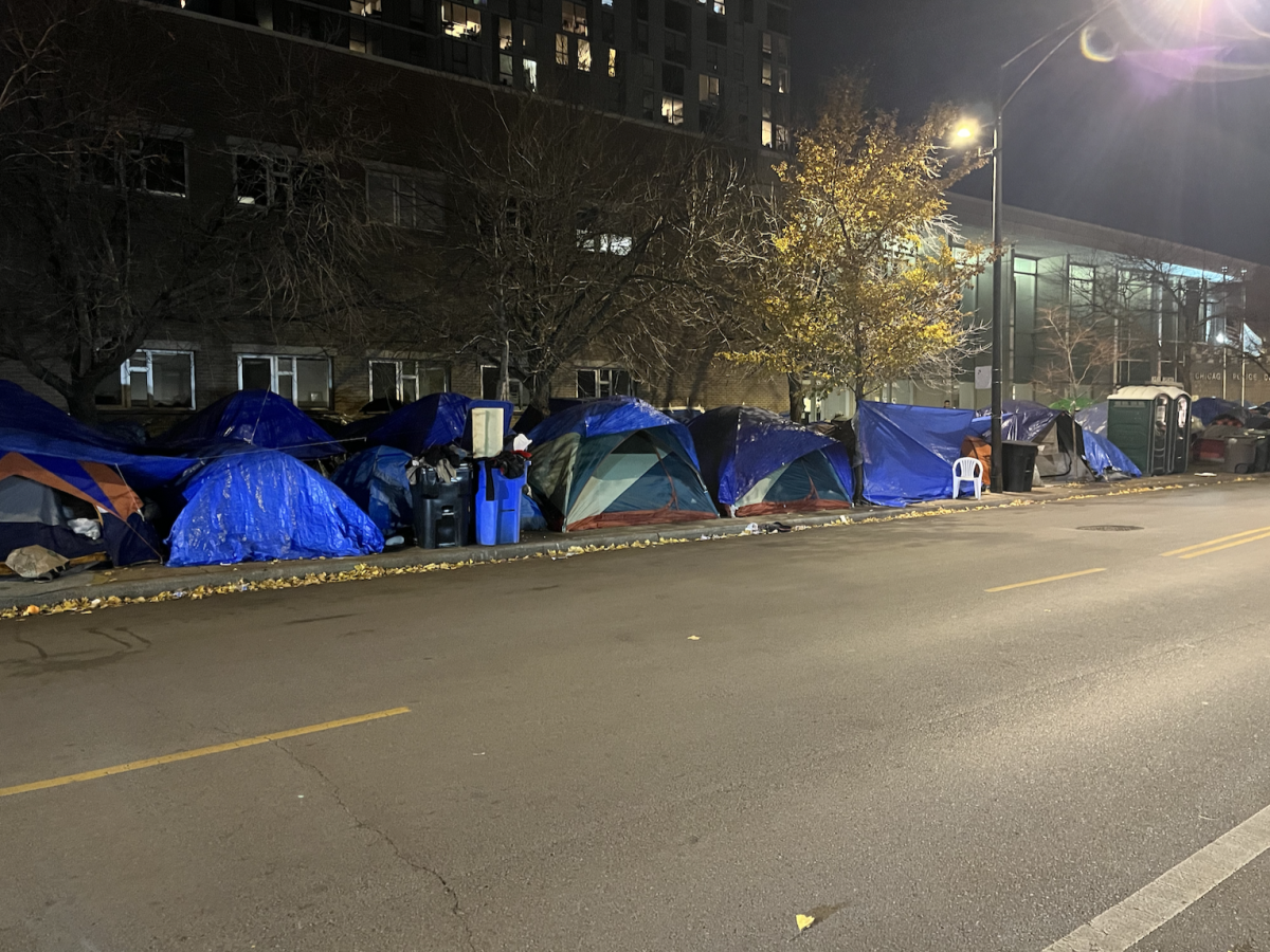 November 2023: Newly arrived migrants camped outside of the 18th Police District, unprotected from Chicago's weather. 