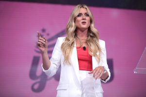 Riley Gaines speaking at Turning Point USA's Young Women's Leadership Summit in 2023.