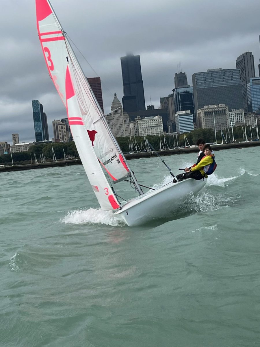 Alex Stamos sailing on Lake Michigan with a teammate.