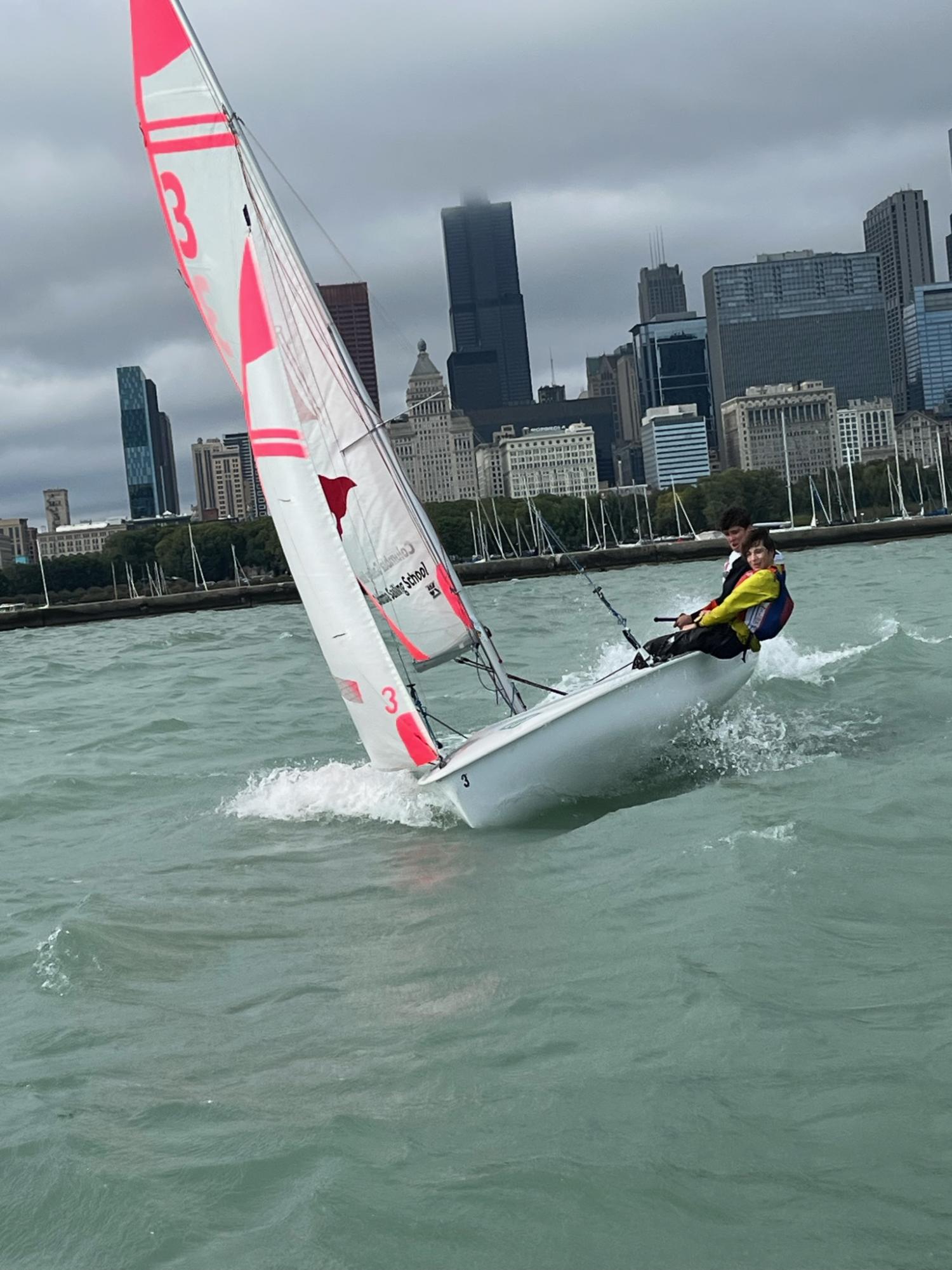 Alex Stamos sailing on Lake Michigan with a teammate.