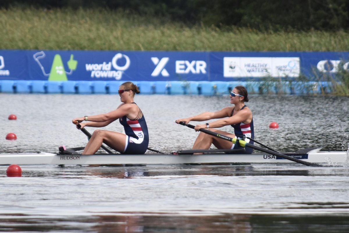 Senior Olivia Lindemann rows with her teammate in Trakai