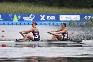 Senior Olivia Lindemann rows with her teammate in Trakai