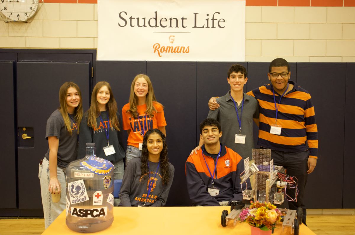 Latin student representatives at an Open House.