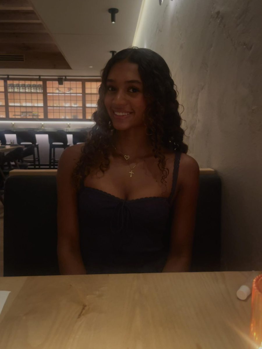 Senior Peyton Remmer in a restaurant