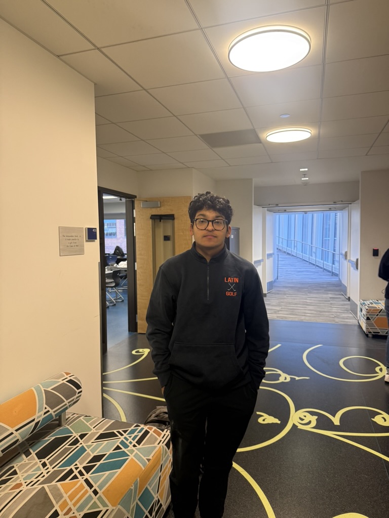 Aryan stands in the Science Bridge