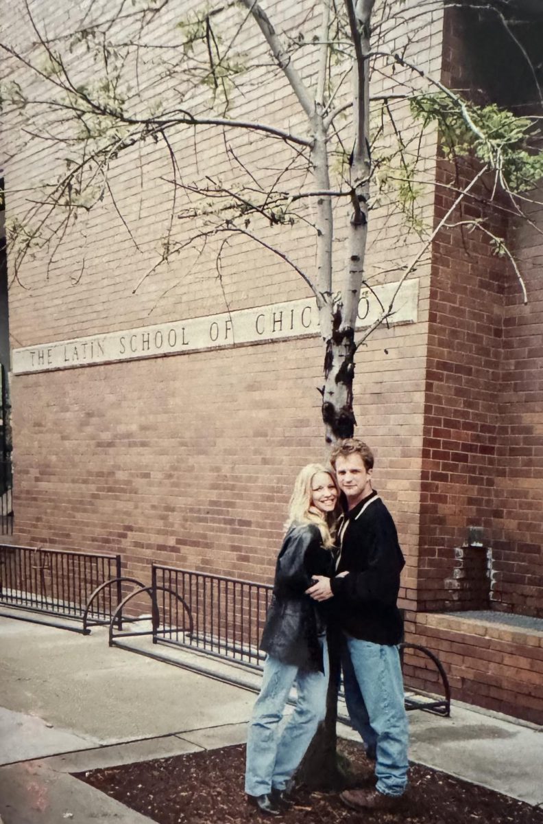 Lauralee Bell Martin and Scott Martin outside of Latin decades after they attended the school.