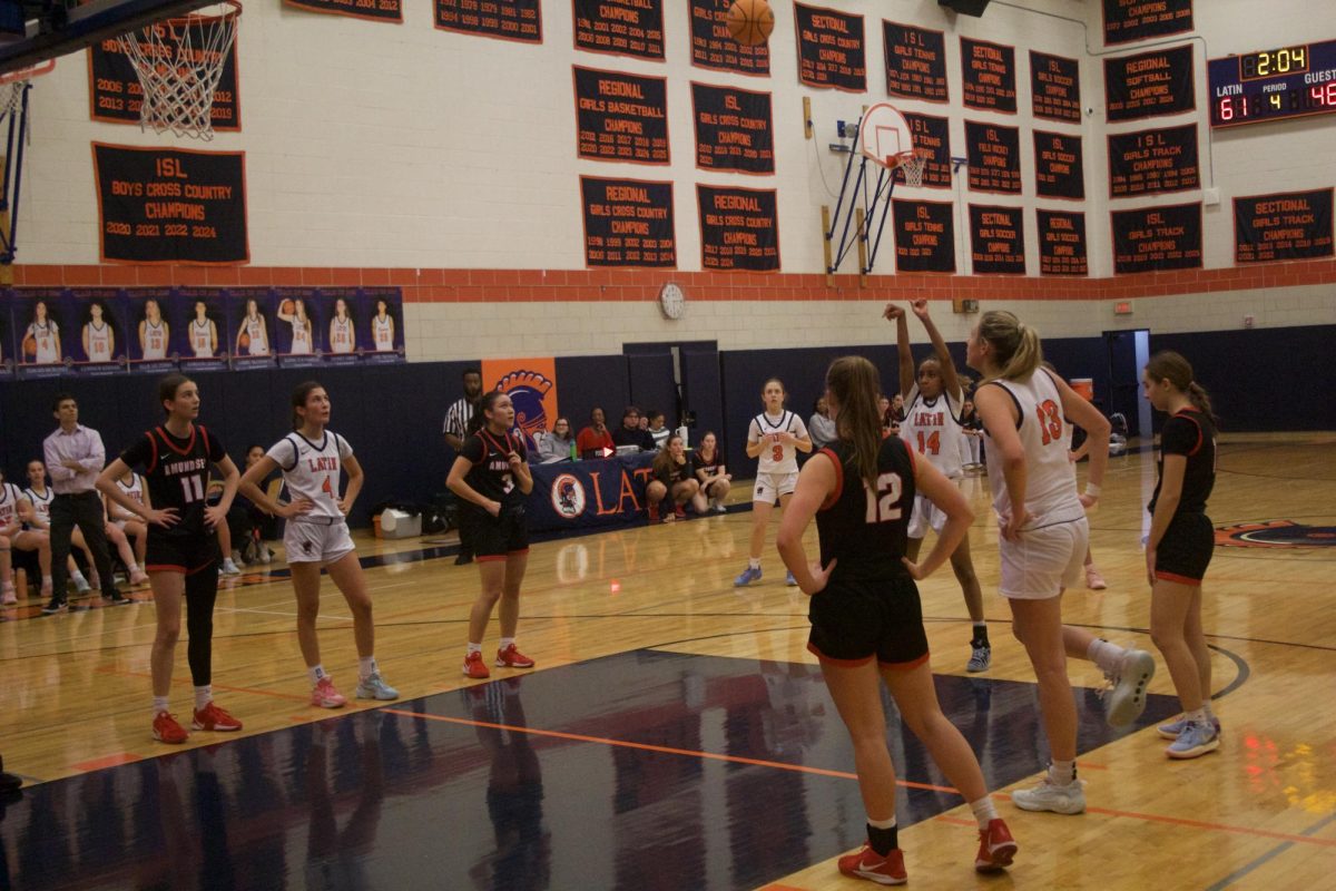 Cali shoots a free throw in the last quarter.