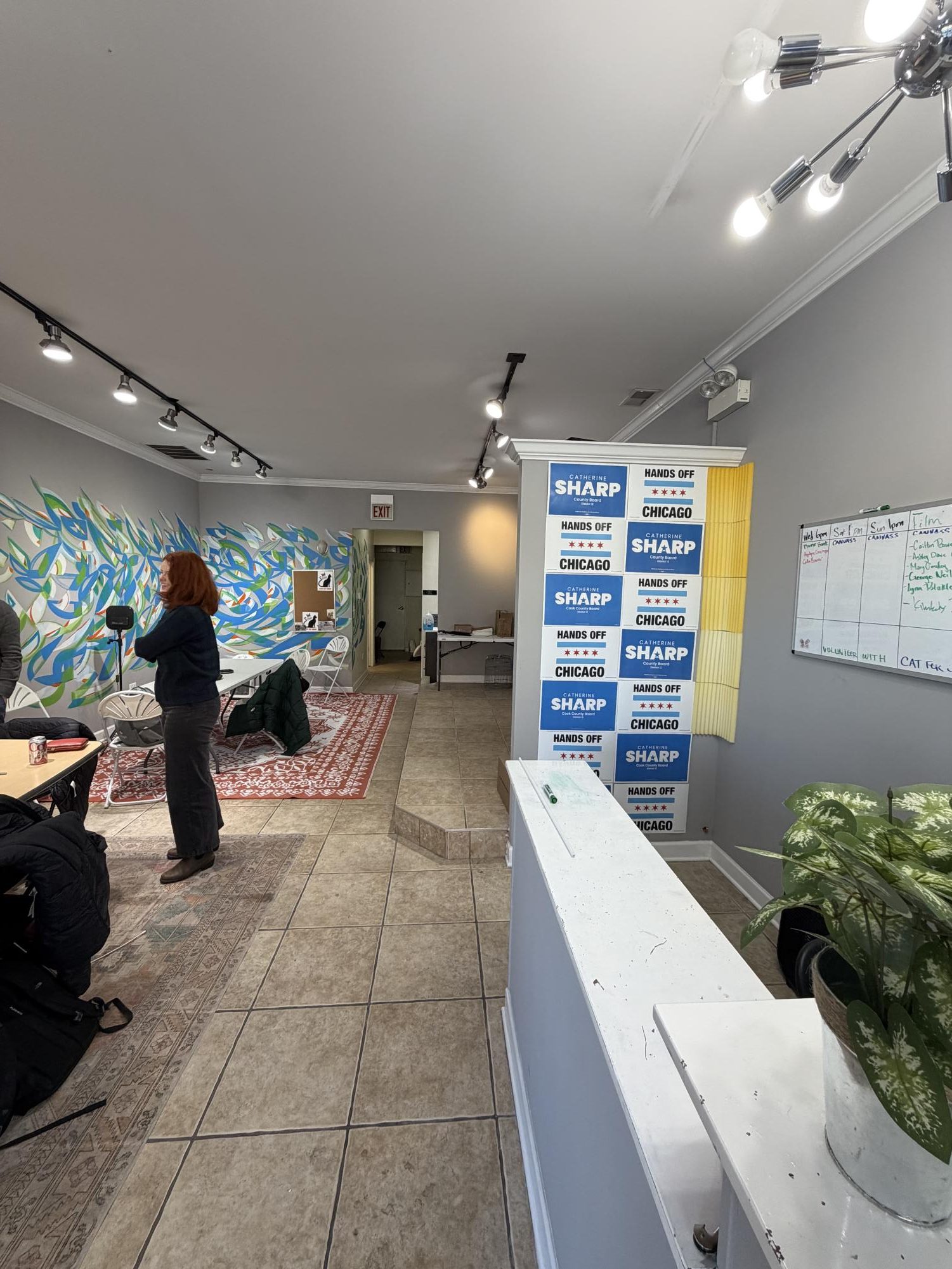 Cat Sharp in her campaign office, preparing to engage Chicago residents on housing, taxes, and immigrant rights.