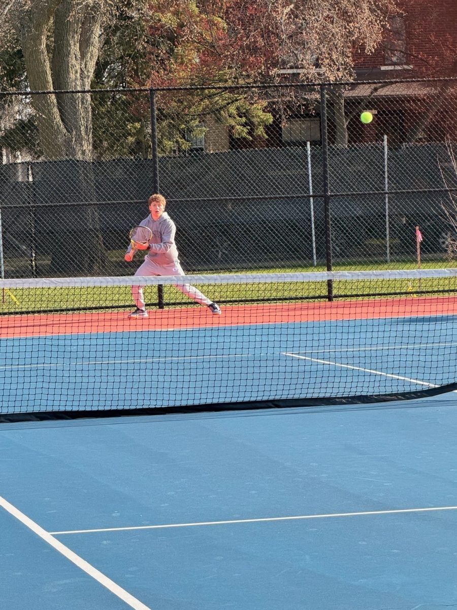 Mark Tismensky prepares to strike a forehand.