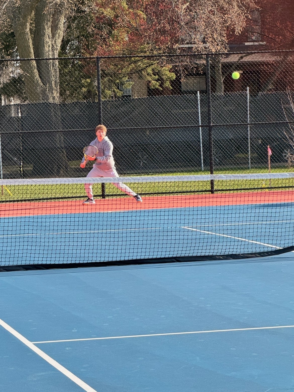 Mark Tismensky prepares to strike a forehand.