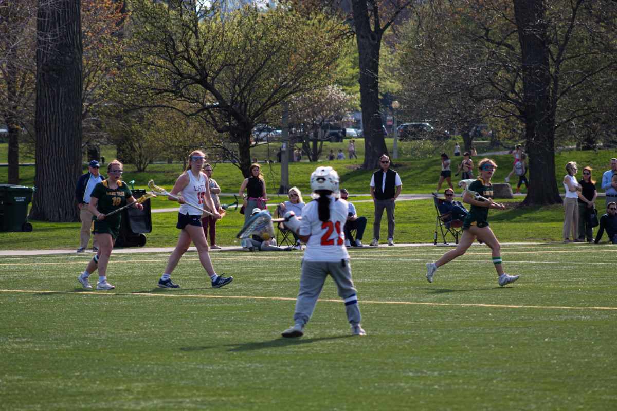 Cece Burt heads down the field during a game last year against Lane Tech.
