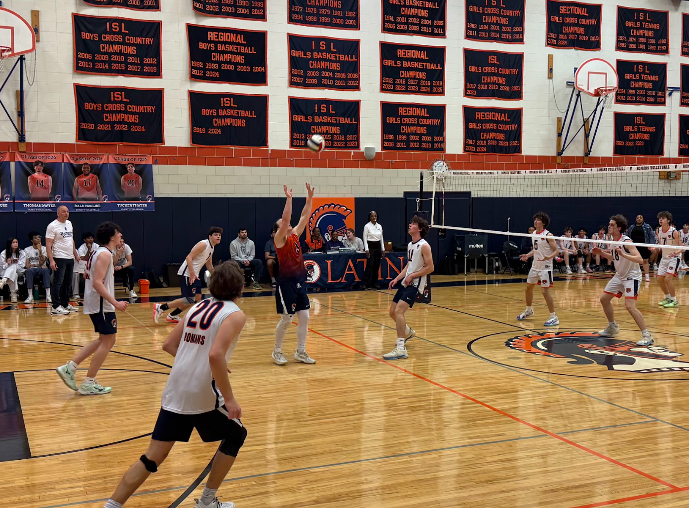 Senior Andrew Legendre prepares to set the ball.